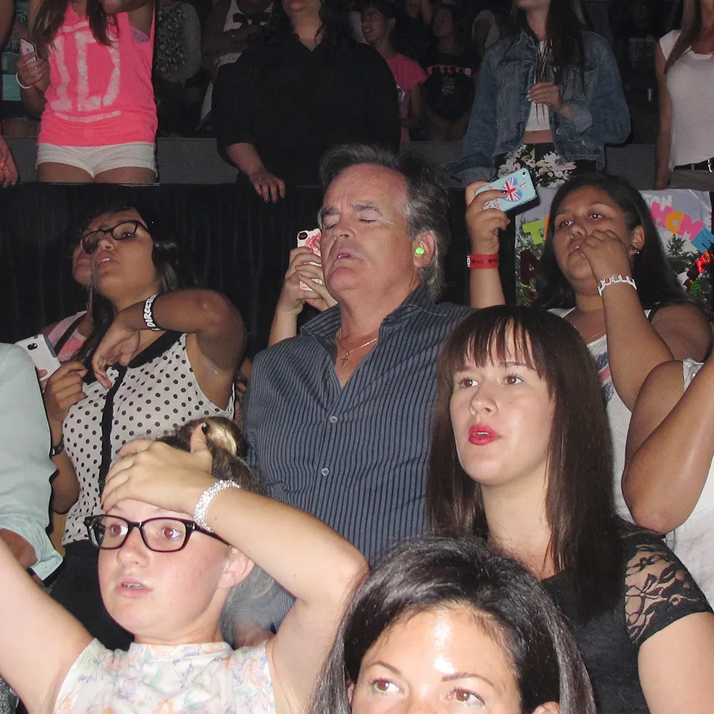 Fotos de padres en un concierto One Direction.